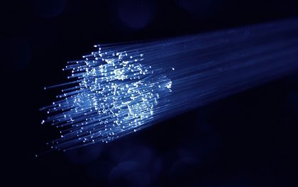 Characterising a steerable fibre under curvature